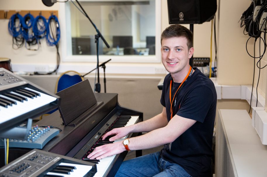 Student playing piano