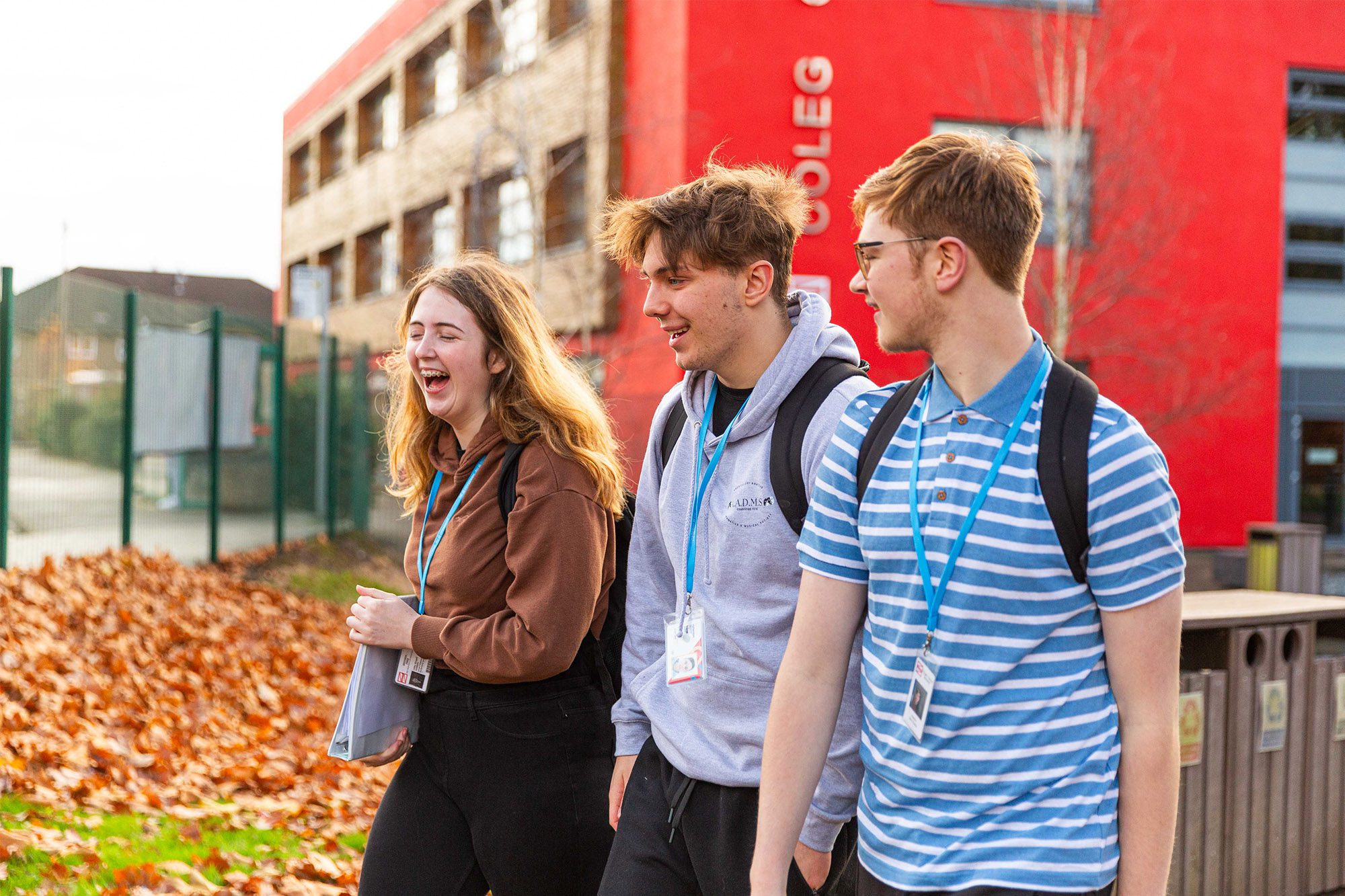 3 students laughing
