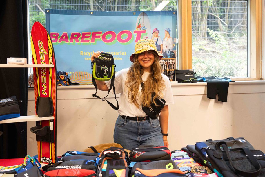 Barefoot owner smiling