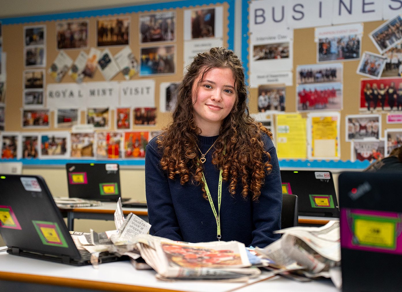 Student smiling in business classroom